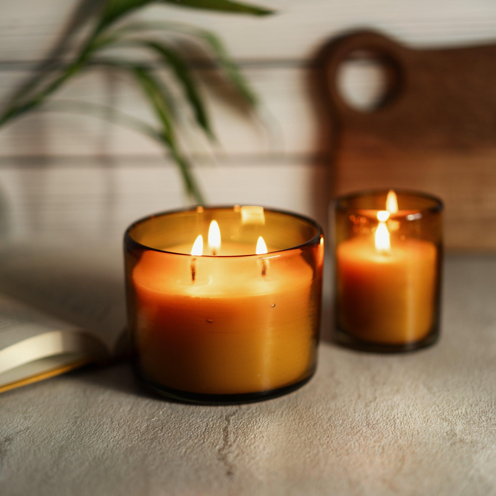 pure beeswax and essential oil scented candles in amber blown glass holders from bluecorn candles